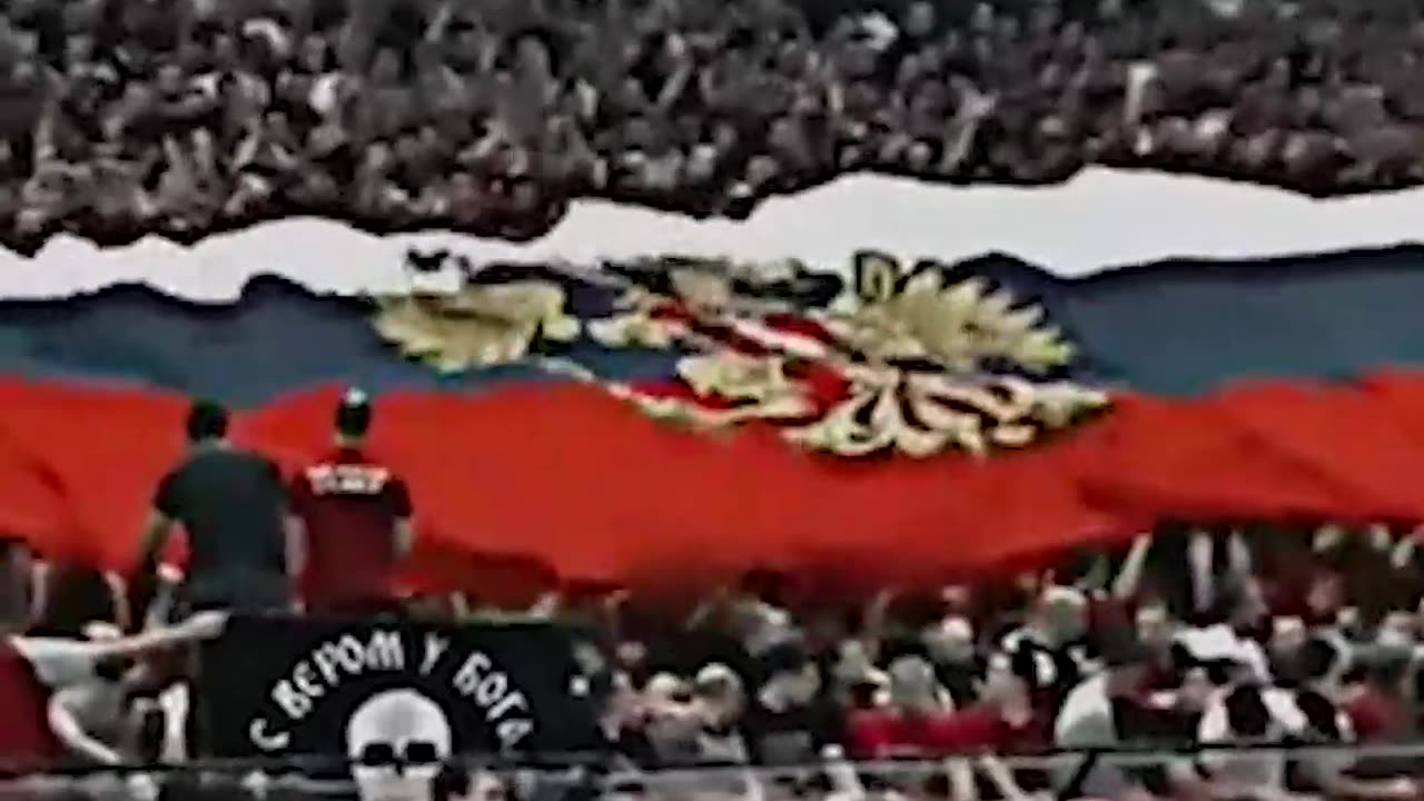 Serbian football fans stretched a huge flag of Russia at the match with Ukraine.