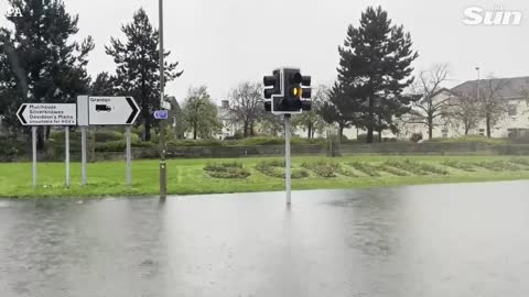 Britain hit by flash flooding as showers lash down causing havoc on roads_2