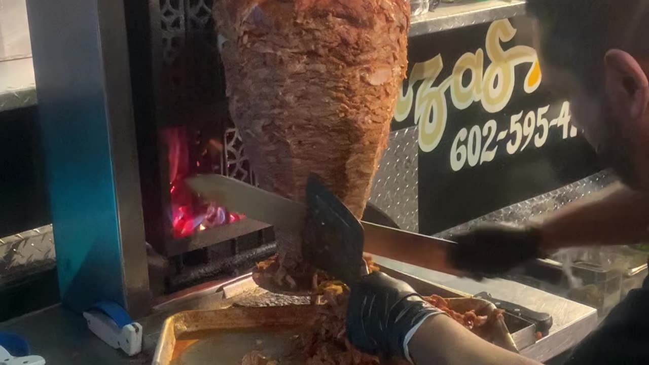 Have You Ever Watched A Chef Cut Some Al Pastor For Your Tacos?