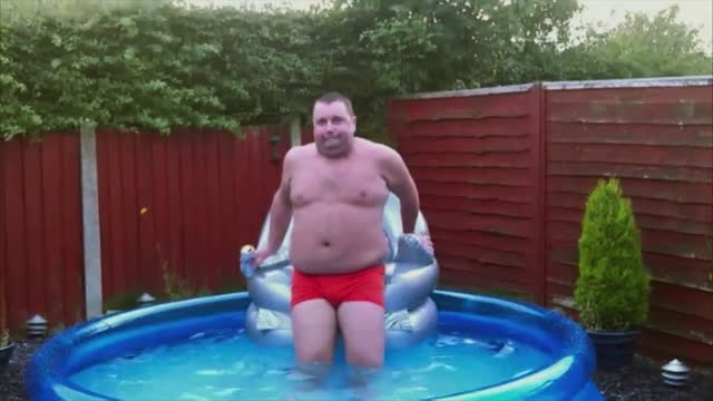 Big man in little bathing suit fails in little pool