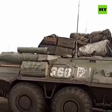 Man welcomes reported Russian armored vehicles near Kharkov