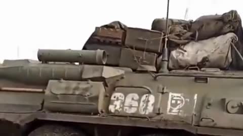 Man welcomes reported Russian armored vehicles near Kharkov