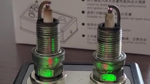 Spark plug detector