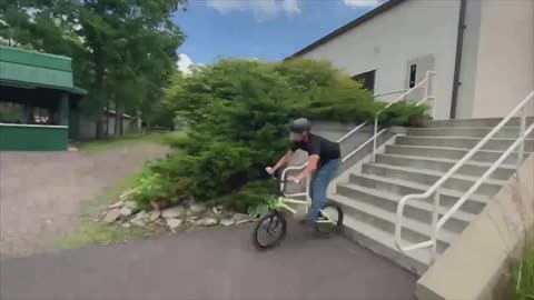 Guy Falls on His Back Attempting a Stairs Bike Trick