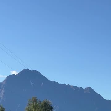 Alaskan Bush Plane Flys Toward Mountains