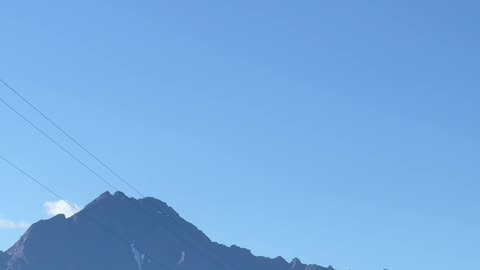 Alaskan Bush Plane Flys Toward Mountains