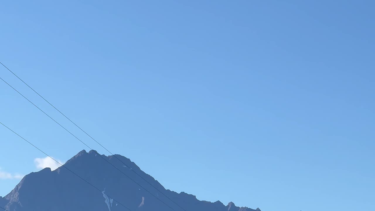 Alaskan Bush Plane Flys Toward Mountains