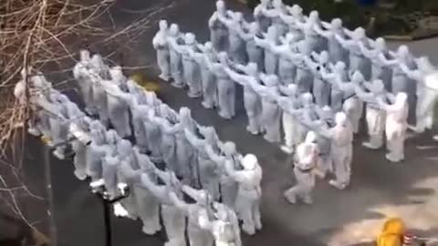 Chinese Stormtroopers Dance During Morning Call Before Going Door-to-Door to Perform COVID Tests