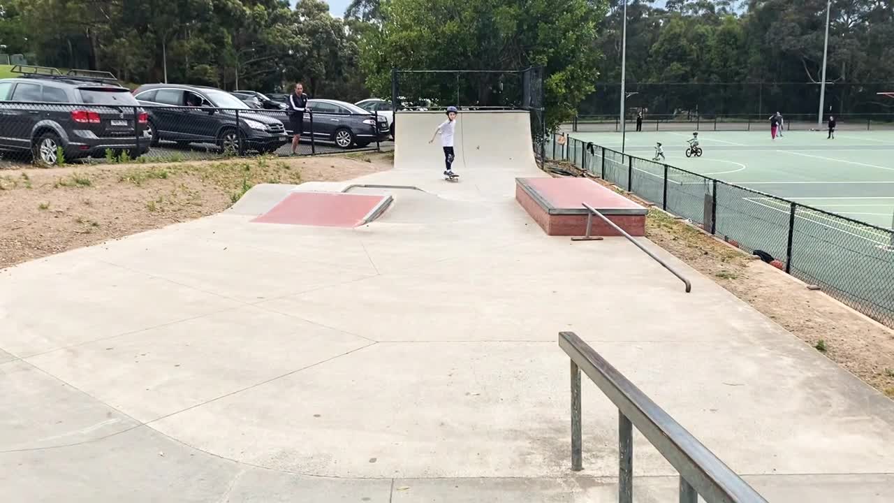 Rock to fake on medium drop in Skateboard