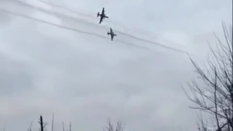 Two pairs of Russian Su-25s "pitching up"