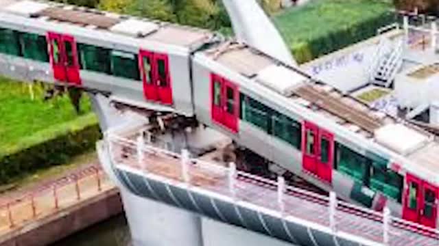 Whale tail sculpture saves Dutch metro train. Getty.