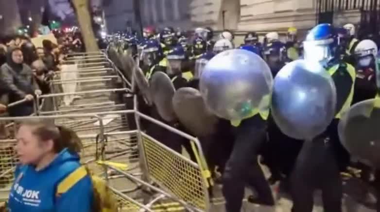 Police clash with protesters at Vaccine passport protest in London Dec. 18 2021