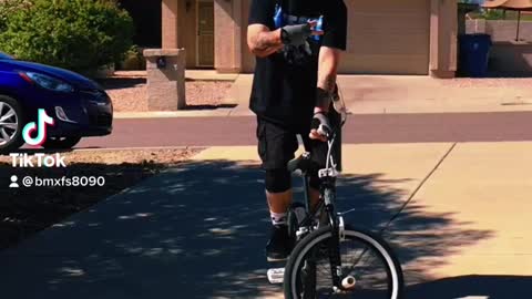 49 riding old school BMX