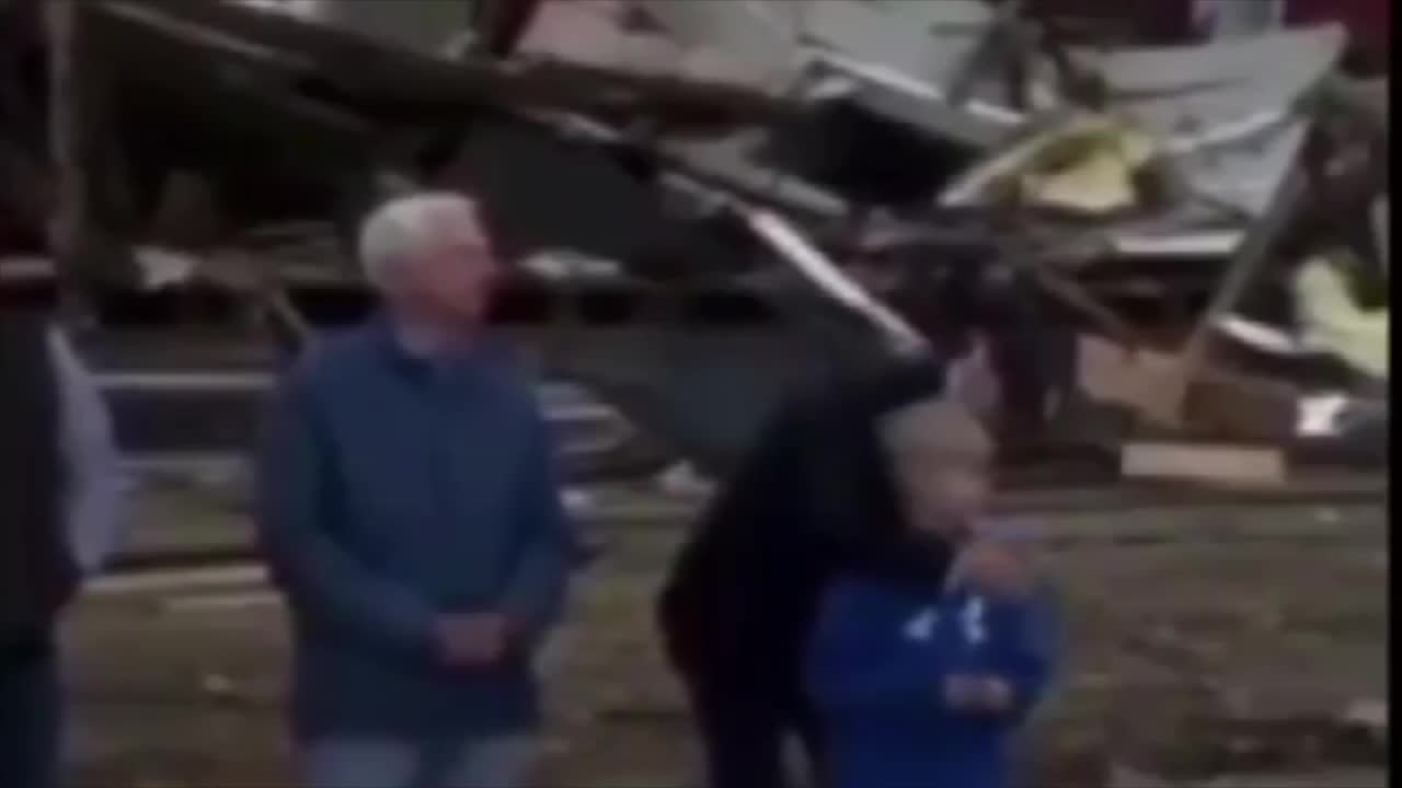 Biden sniffs and holds boy while in Kentucky disaster area , With "Secret service" voice over