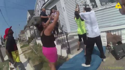 Buffalo Police Body Cam Shows A Child And Woman Getting Out From A Burning 2nd Story Home