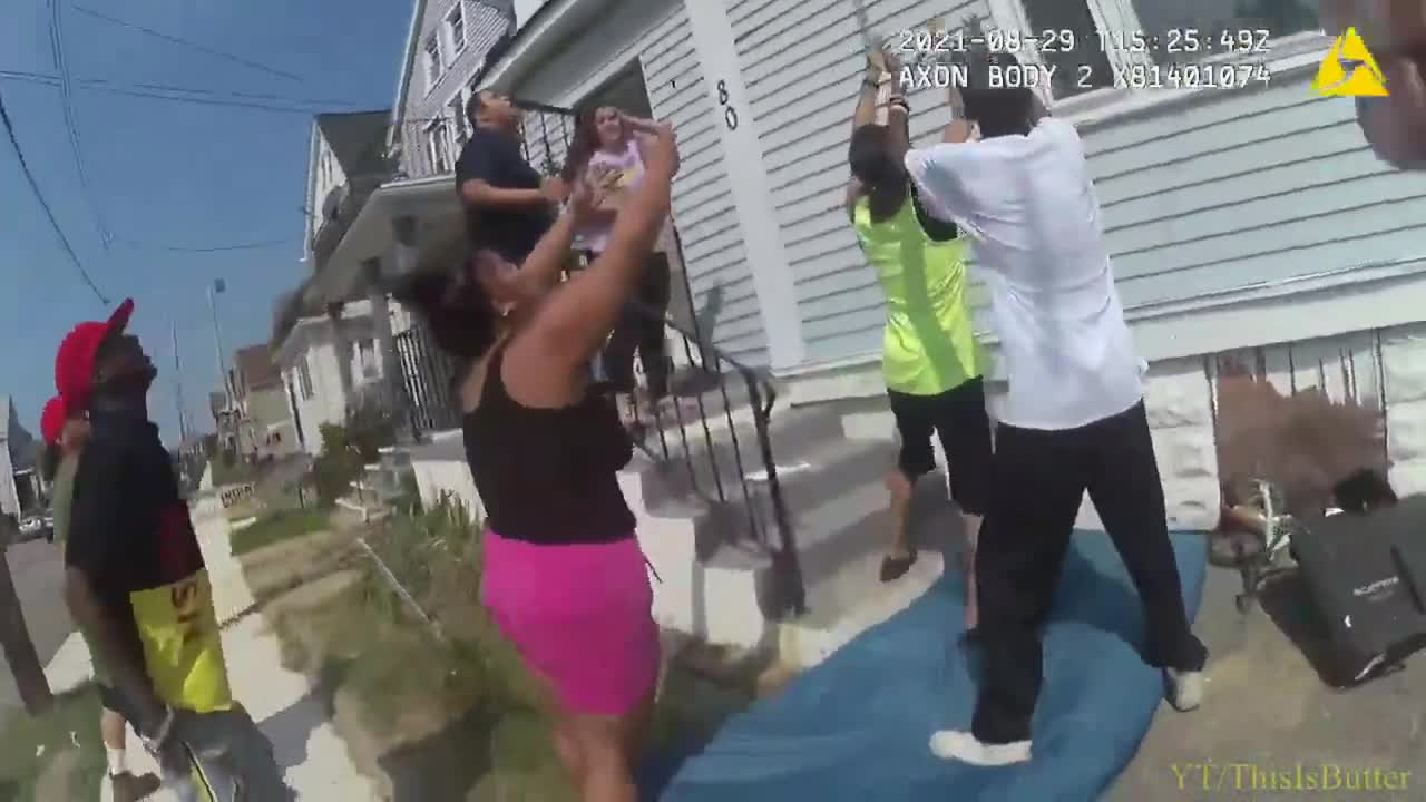Buffalo Police Body Cam Shows A Child And Woman Getting Out From A Burning 2nd Story Home