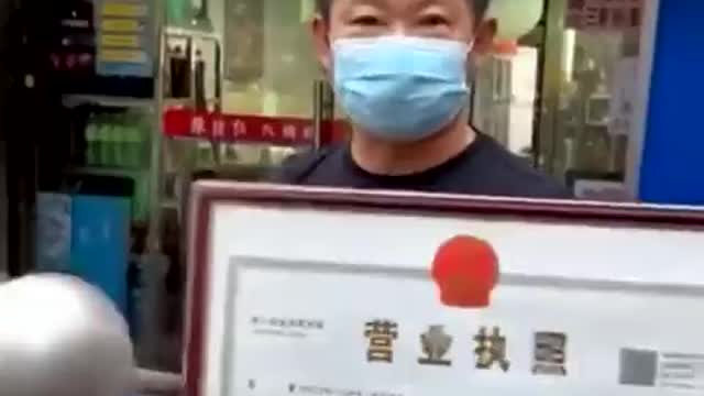 A Chinese restaurant owner says when he woke up, he found a Covid barrier around his business