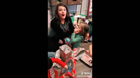 Kid Says Bad Word When Receiving Christmas Gift - Hilarious!!