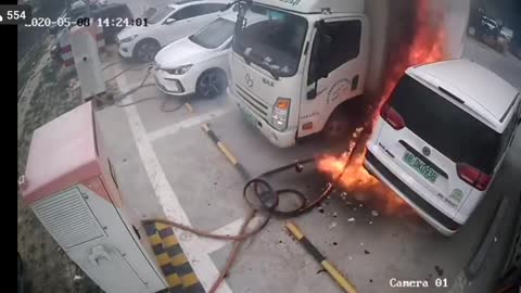 An electric car burns while charging.