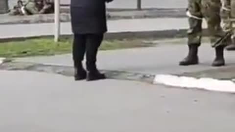 Russian soldier came with peace and shout by ukrainian woman