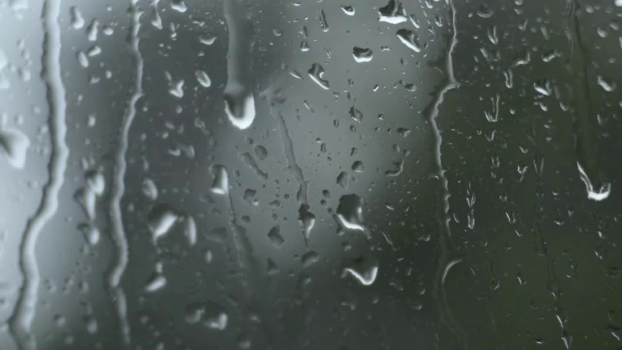 Rain drops on window, late pouring rain sounds