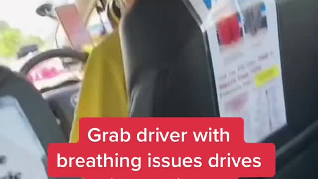 Grab driver with breathing issues drives with respirator