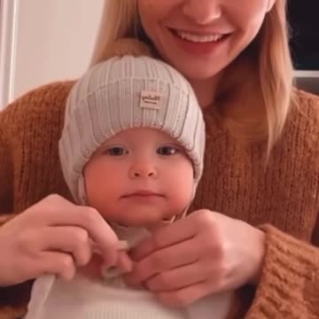 Baby imitating bike noise with mouth