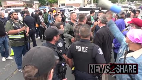 Protesters fight over Pride Month, three arrested, outside School Board m.