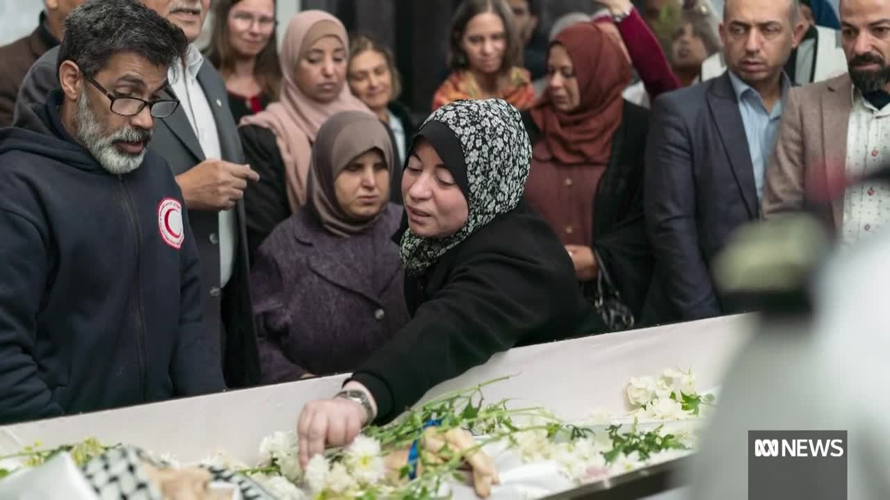 Hundreds gather to mourn Australian humanitarian worker in Gaza _ ABC News