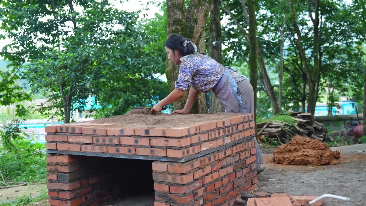 Chinese girl builds oven and makes homemade bread