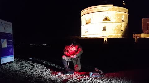 Breaking down the Trekology Yizo go camping chair . At a castle. Night time