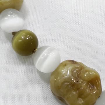 Handmade + Knotting Unique 36” Necklace with Yellow Jade, Cat Eye. Promotes Luck