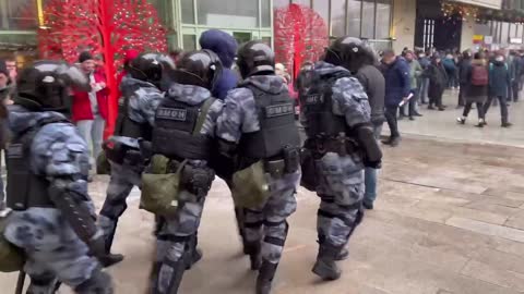 Police arrested a protestor who was earlier throwing stuff at police