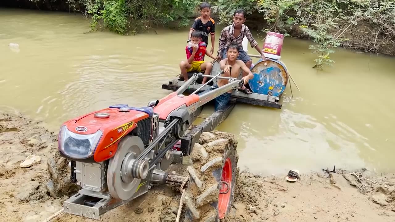 Funny Young And Intelligent Young Workers Transport Water From the River