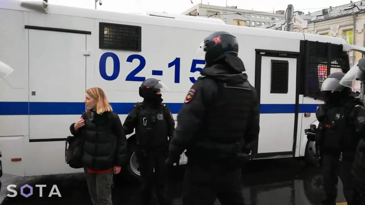 Moscow police deals with girl protester