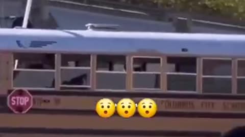 School bus at a railroad crossing.
