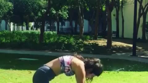 Girl Gets Shocked With Sprinkler During Yoga Practice