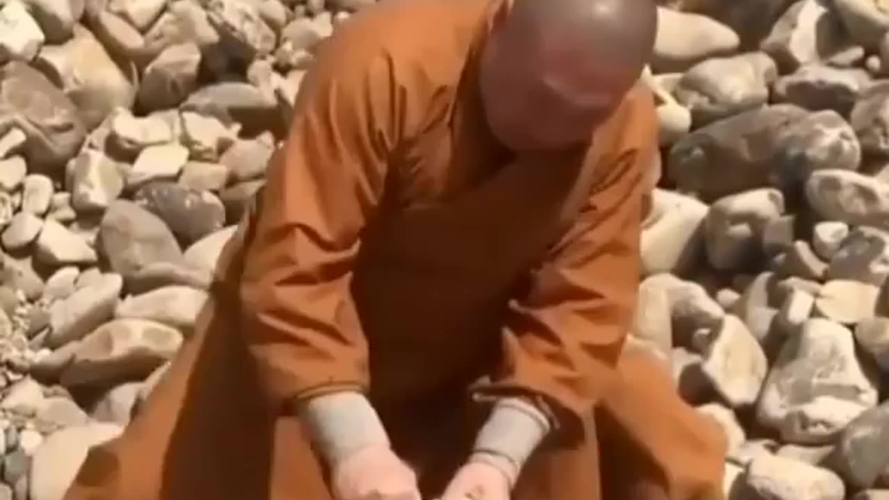 This monk is destroying the stone with just his fingers. 😲