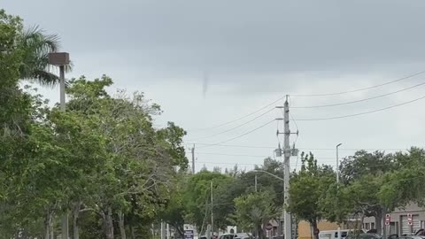 Funnel Cloud Forms Near Sunrise, Florida