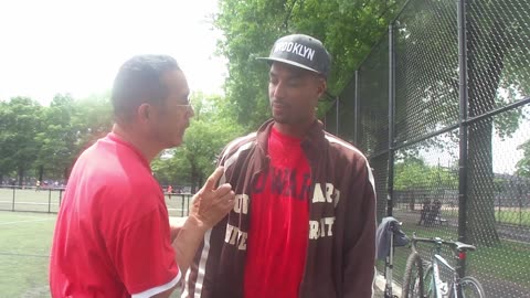 Luodong Chi Checks Black Man At The Soccer Game