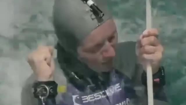 he Slovenian broke world records by diving 122 metres, using no oxygen equipment.