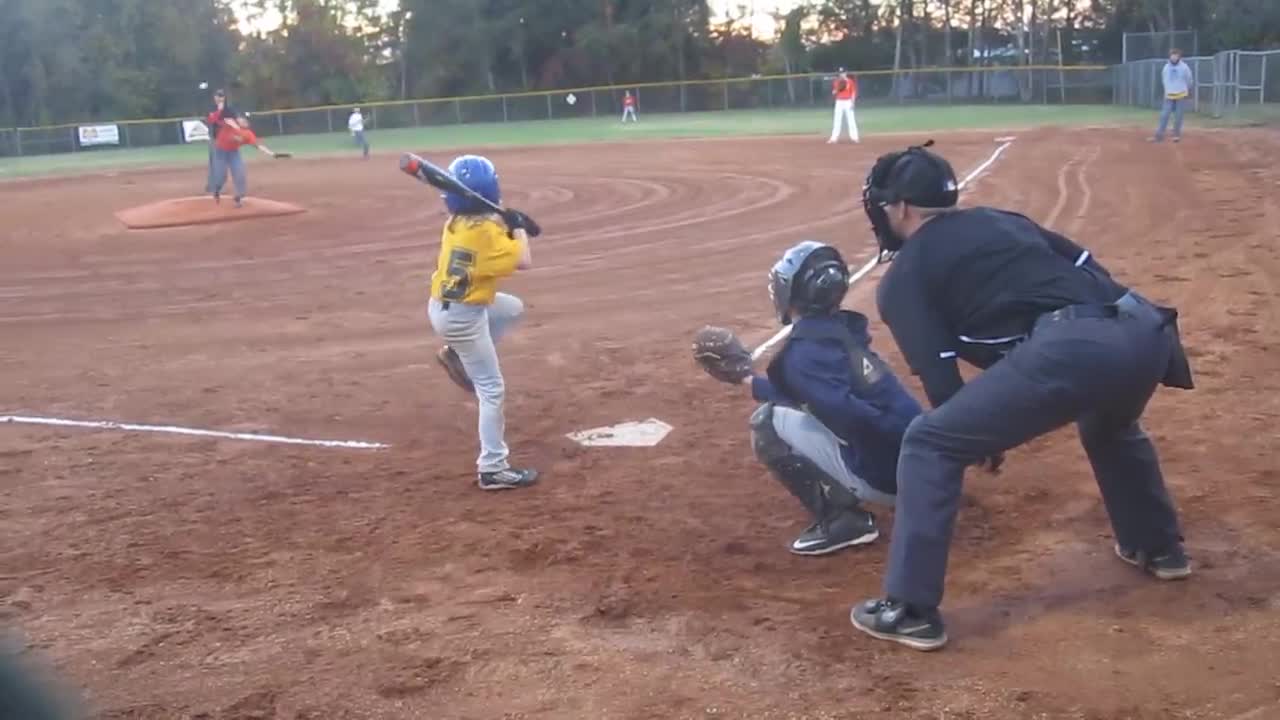 Alex (8yr) playing 14u baseball with big brother's team