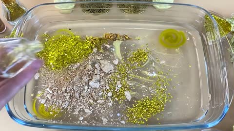 GOLD SLIME | Mixing makeup and glitter into Clear Slime | Satisfying Slime Videos