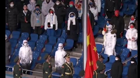 Raising the national flag and playing the national anthem at the opening ceremony