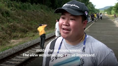 Thailand's 'floating train' a hit as dam waters rise