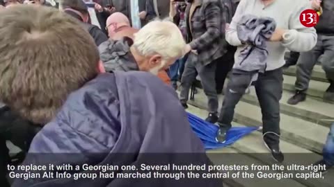 Anti-West protesters tear down, burn EU flag outside Georgian parliament