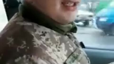 Ukrainian soldier singing about going to war.