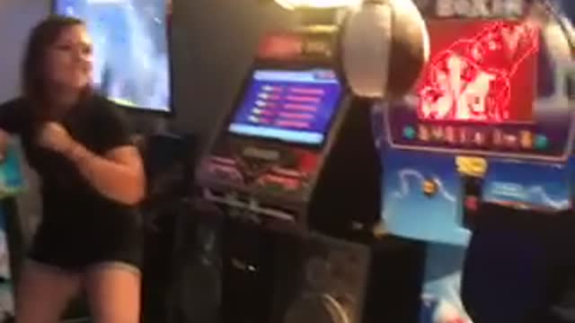 High Kicking an Arcade Punching Bag Fail