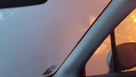 Woman flees the Lahaina Fire