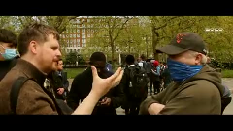 Explaining The Trinity to baby Christian Bob Speakers' Corner